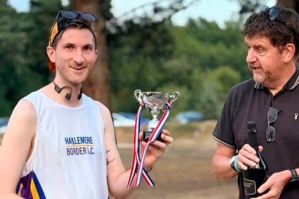 Matt Smith is presented with the Bowlhead Green Chase Trophy