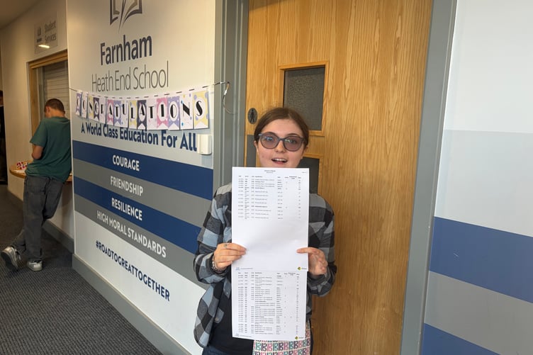 Amelie Read collecting her results at Farnham Heath End School