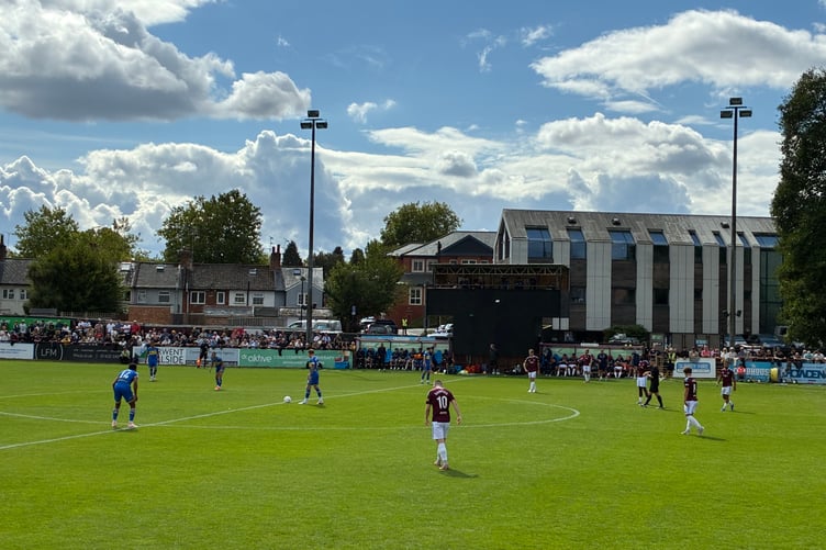 Action from Farnham Town's National League South match against Torquay United
