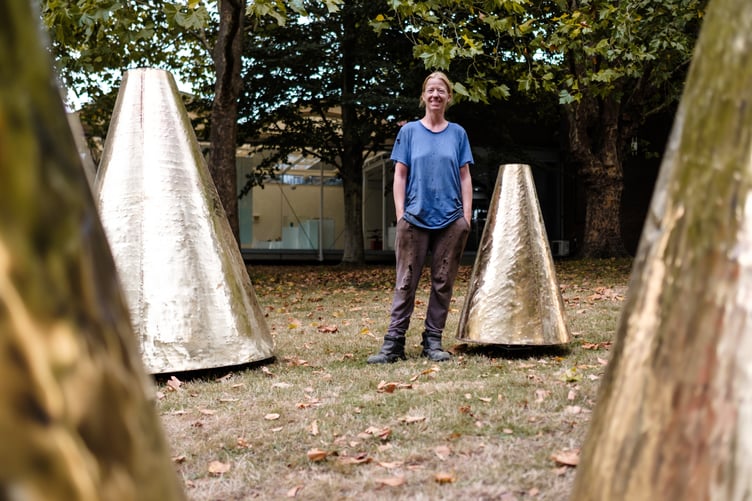 The artist Natalie Bradwell's "A Hands Turn" artwork was re homed at the Farnham Sculpture Garden
