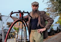 Penny-farthing lights up Farnham's first Glow Ride for safer cycle routes